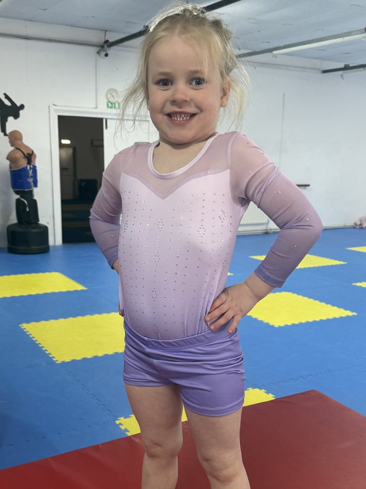 A young gymnast in the gym